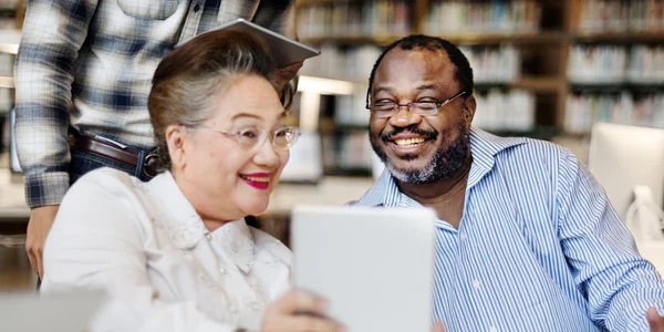 Diversity middle aged people studying — Stock Photo, Image