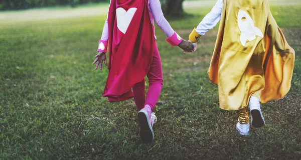 Superhero Kids playing outdoor — Stock Photo, Image