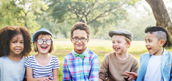 Happy kids playing in park