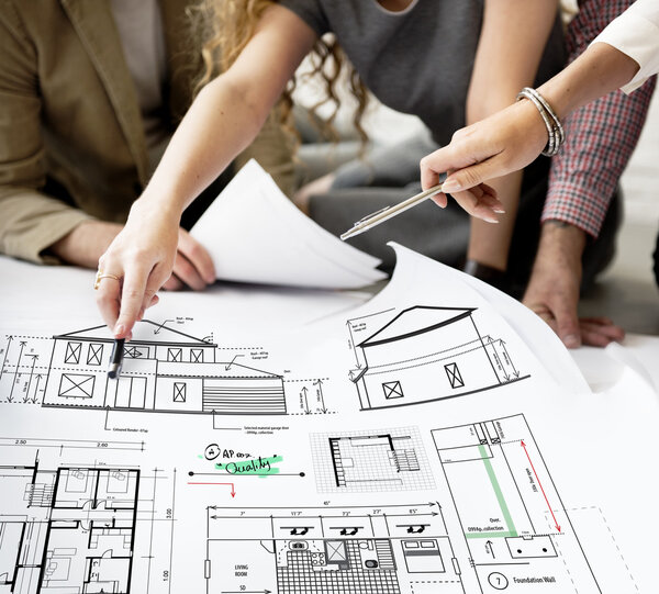 designers working with poster and Architec