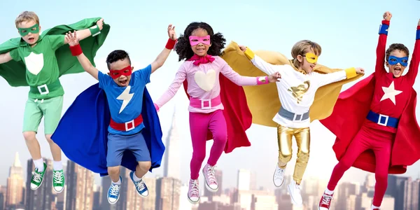 Superhero Kids playing together — Stock Photo, Image