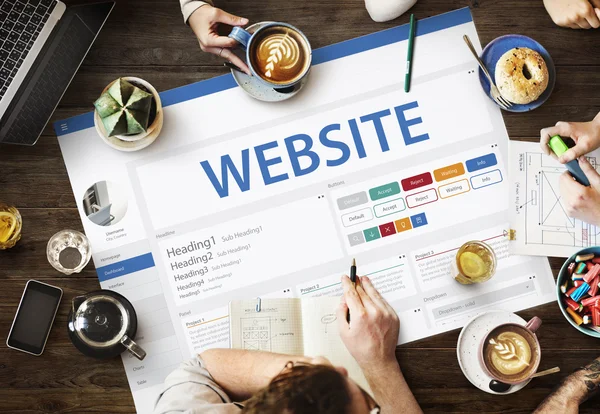 Table with poster with Website — Stock Photo, Image