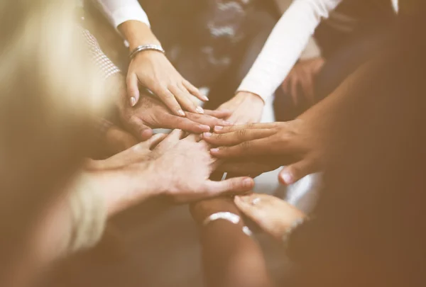 People with hands together — Stock Photo, Image