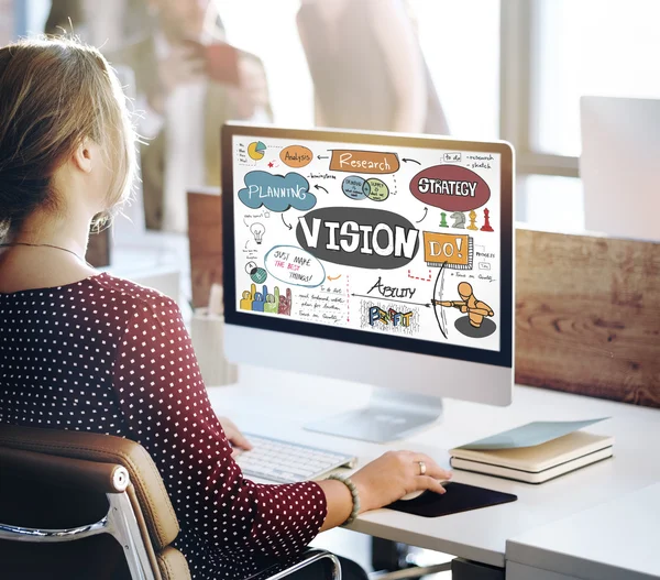 Business woman working on computer with vision — стоковое фото