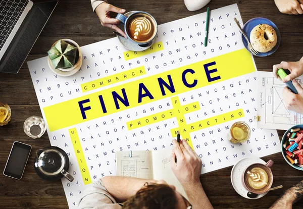 Table with poster with Finance — Stock Photo, Image