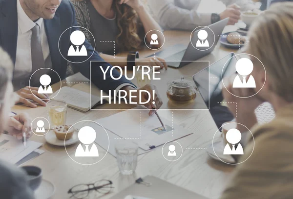 People discussing about You Are Hired — Stock Photo, Image