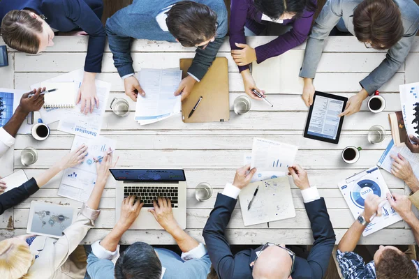 Colegas ocupados en la reunión de negocios — Foto de Stock