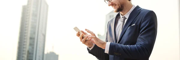 Businessman browsing mobile — Stock Photo, Image