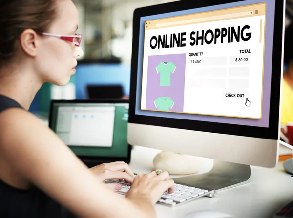 Businesswoman working on computer with online shopping — Stock Photo, Image