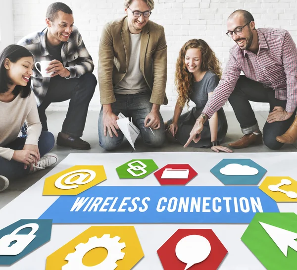 Designers working with poster and Wireless Connection — Stock Photo, Image