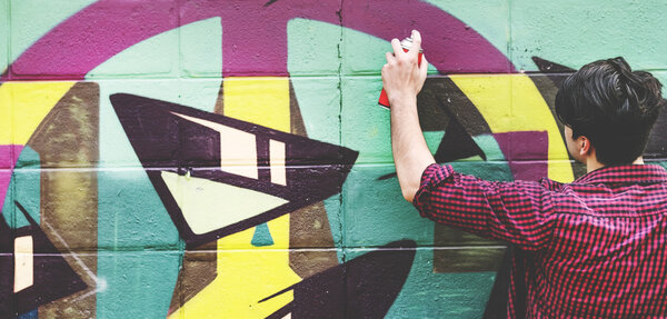 Man holding Spray for Graffiti
