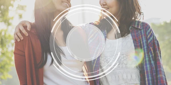 Happy sisters in park — Stock Photo, Image