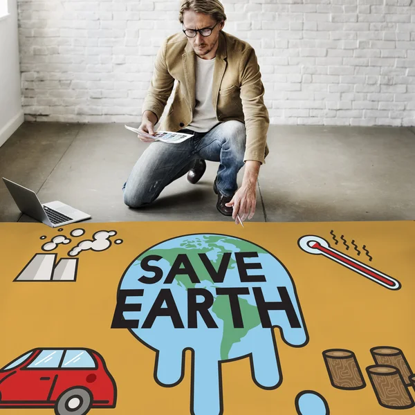 Geschäftsmann arbeitet mit Save Earth — Stockfoto