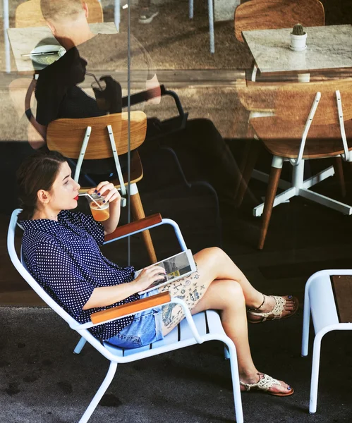 Woman drinking beverage — Stock Photo, Image