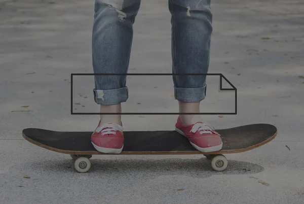 Woman on skateboard on background — Stock Photo, Image