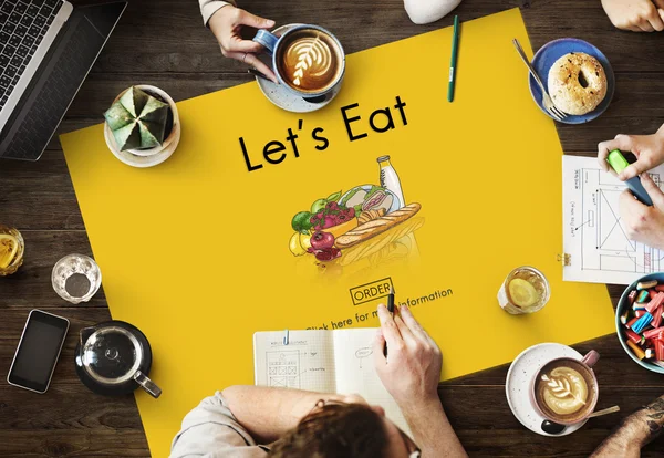 Table avec poster avec Let's Eat — Photo