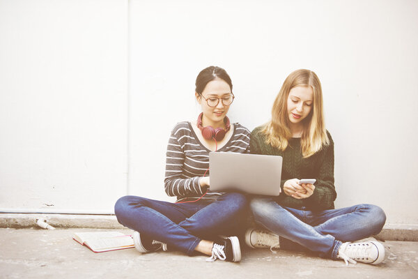 portrait of girls with laptop