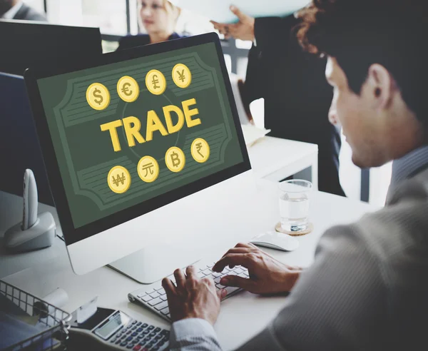 Businessman working on computer with trade — Stock Photo, Image