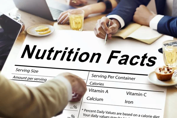 People discussing about Nutrition Facts — Stock Photo, Image