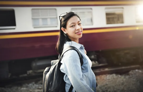 Beautiful girl on railway platform — Stock Photo, Image