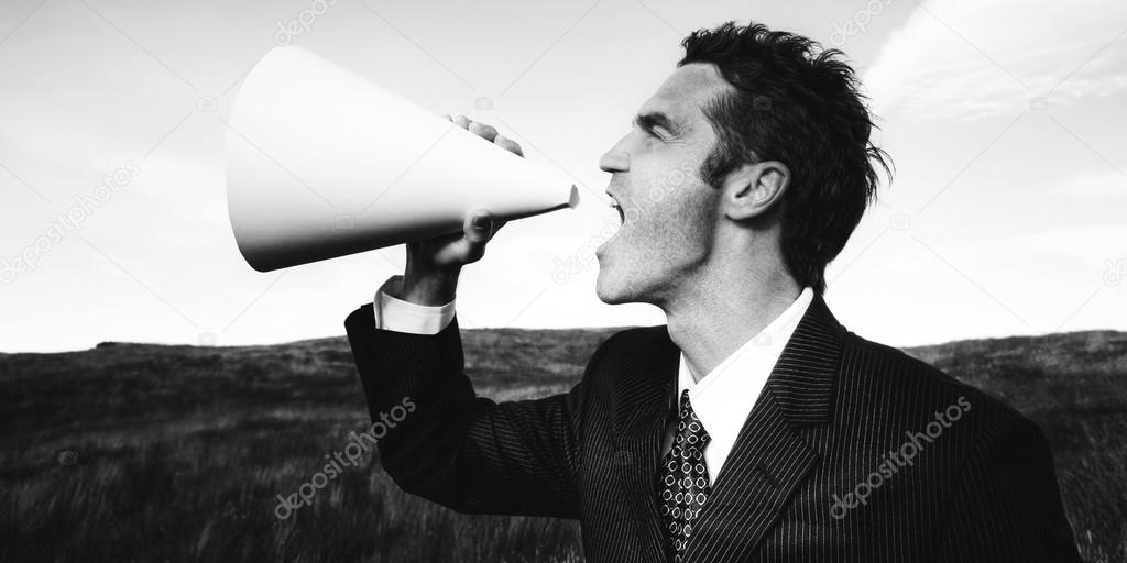 Businessman in suit with Megaphone 
