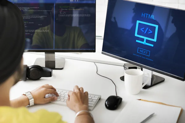 Businessman working on computer with HTML — Stock Photo, Image