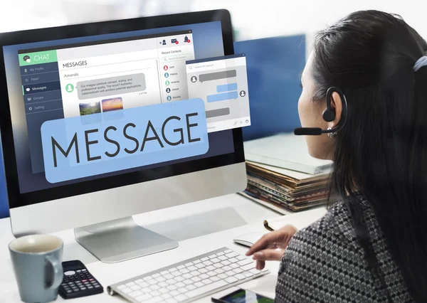 businesswoman working on computer with Message