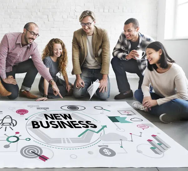 Designers working with poster and New Business — Stock Photo, Image