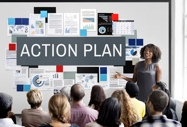 Människor på seminarium med handlingsplan — Stockfoto