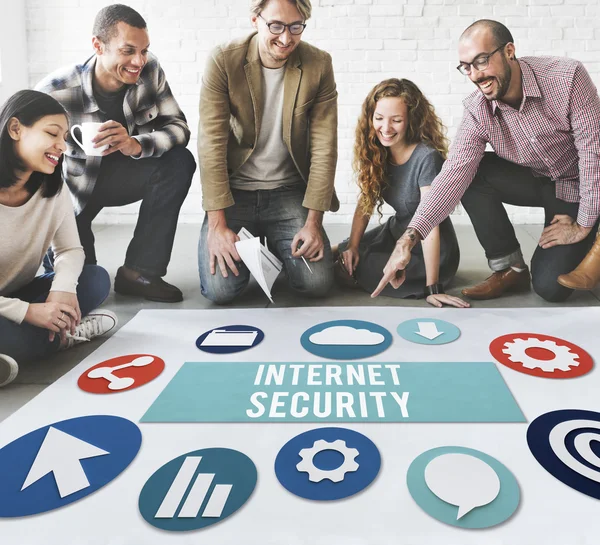 Designers working with poster and internet security — Stock Photo, Image