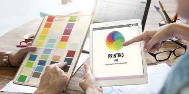 People working with tablet and color chart clipart