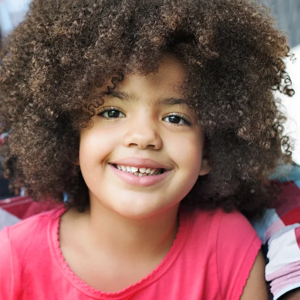 Cute girl looking at camera — Stock Photo, Image