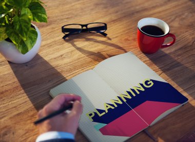 Defterde yazan iş adamı