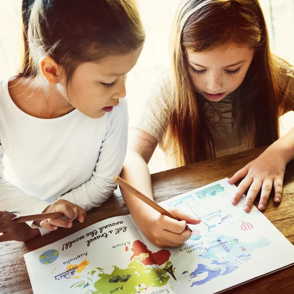 Girls Drawing in coloring-book — Stock Photo, Image