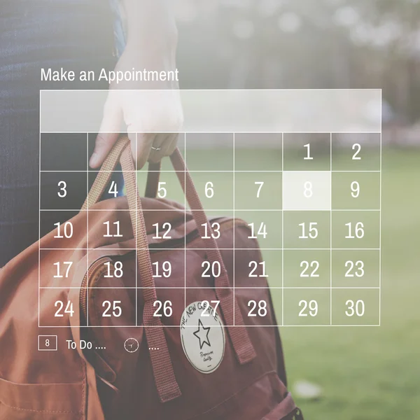 Woman holding backpack — Stock Photo, Image