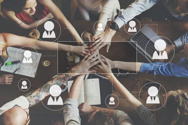 Business-team som håller händerna ihop — Stockfoto