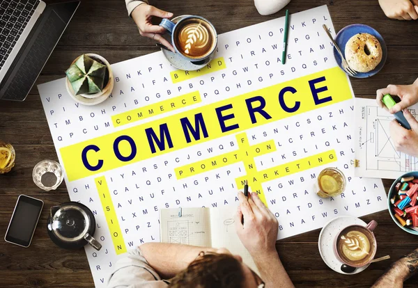 Table with poster with Commerce — Stock Photo, Image