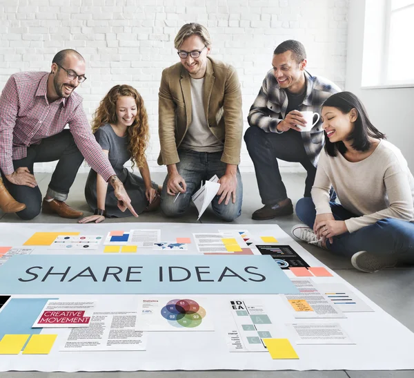 Designers working with poster and Share Ideas — Stock Photo, Image