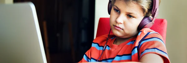 Bored Boy with headphones — Stock Photo, Image