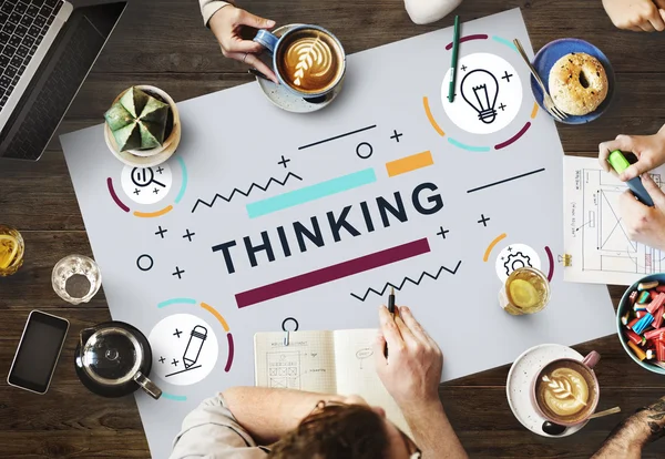 Table with poster with Thinking — Stock Photo, Image