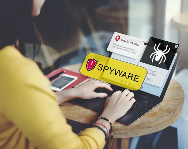 Spyware logo na obrazovce notebooku — Stock fotografie