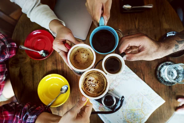 Friends drinking coffee in bar — Stock Photo, Image