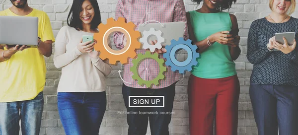 People stands near wall and gears — Stock Photo, Image