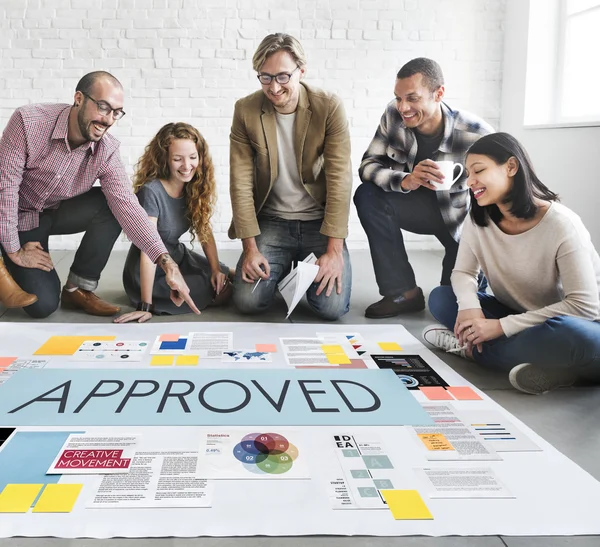 Designers working with poster and approved — Stock Photo, Image