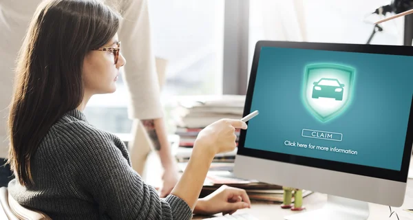 stock image people looking on computer screen