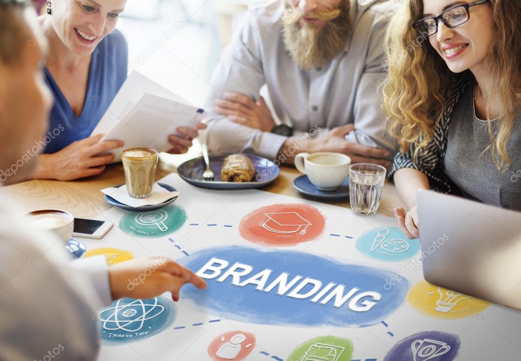 Group of people sit at table and discussing about Branding Concept