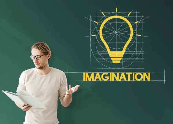 Businessman working with imagination — Stock Photo, Image