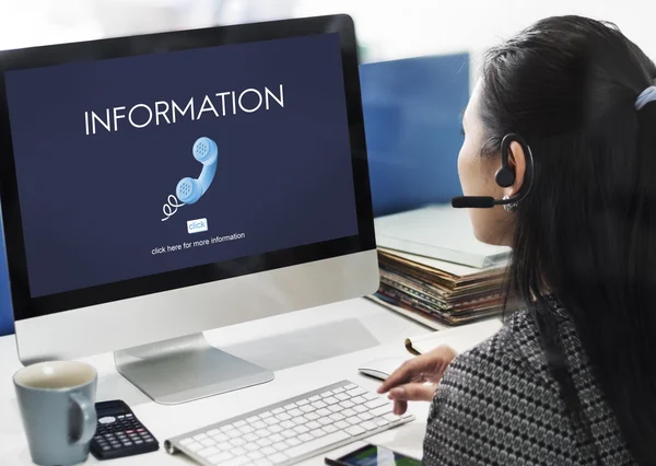 Businesswoman working on computer with information — Stock Photo, Image