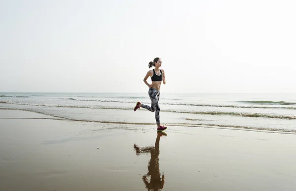 Woman Running on Beach — Stock Photo, Image