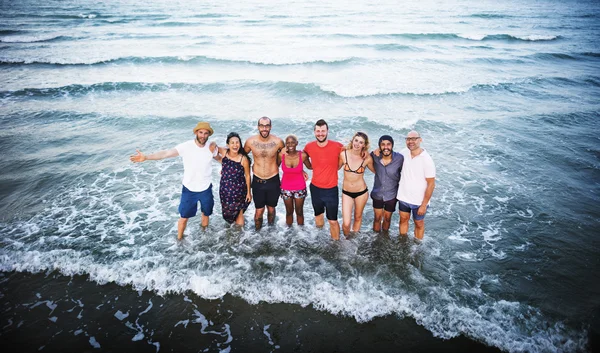 Friends on summer beach — Stock Photo, Image